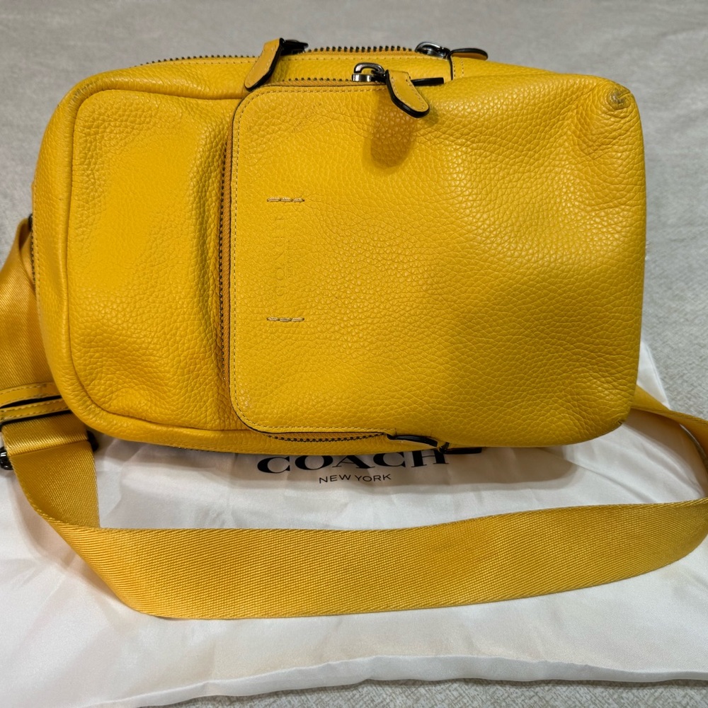 Coach yellow leather Gotham sling backpack